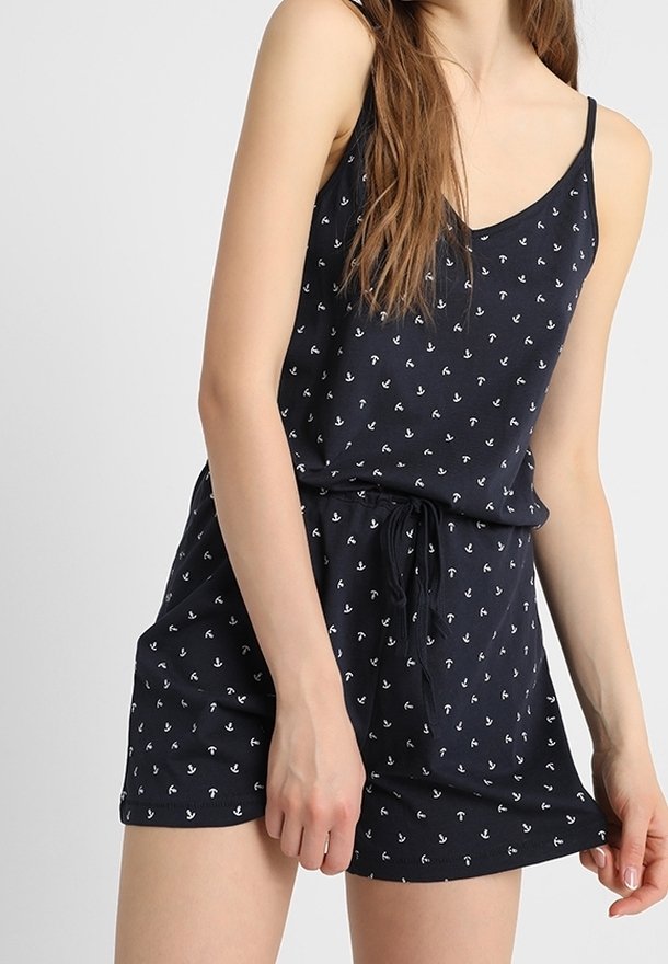 Robe sans manches bleu marine avec imprimé ancre blanche, taille à cordon de serrage et coupe décontractée. Fabriquée en tissu doux avec une texture lisse.