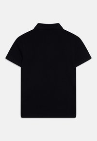 Tommy Hilfiger MONOTYPE - Polo shirt - desert sky