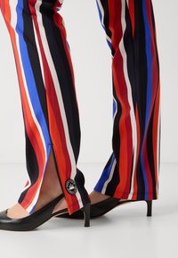 Marc Cain Leggings - Pantaloni - cranberry