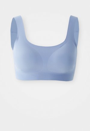 Light blue wireless bra featuring a smooth texture, wide straps, and a rounded neckline. Seamless design for comfort with soft fabric.