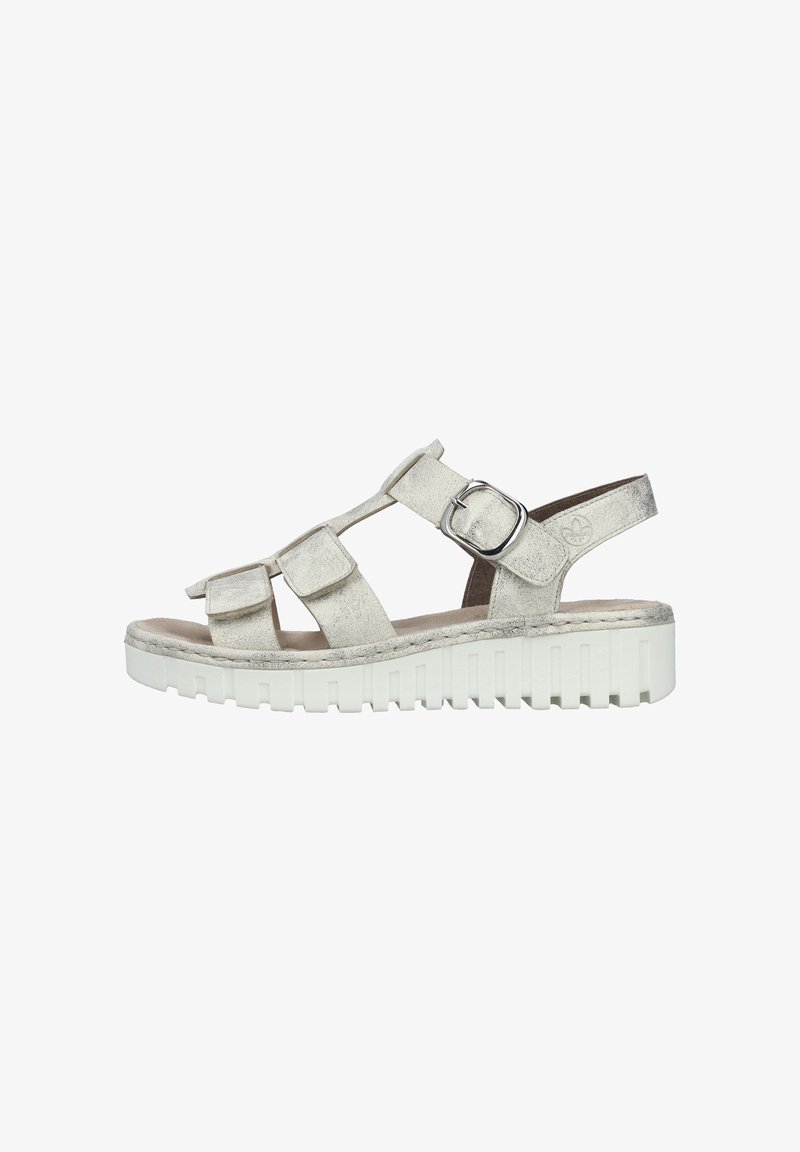 Strappy sandal in metallic silver suede with adjustable buckle. Features a chunky white platform sole with ridged texture for traction.