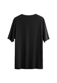 T-shirt nera a maniche corte con collo a giro e un sottile logo a forma di forbici sul retro del collo. Tessuto morbido al tatto.
