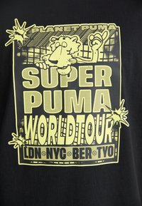 Black T-shirt featuring a yellow graphic print with "PLANET PUMA," "SUPER PUMA," and "WORLDTOUR" text, along with cartoon character details.