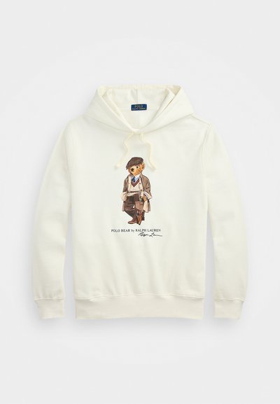 Felpa color crema con illustrazione di un orso in blazer e cappello, dotata di cappuccio con coulisse e polsini e orlo a costine.