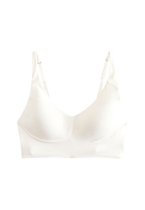 Sujeción inalámbrico blanco con tirantes ajustables y copas moldeadas, diseñado para comodidad y soporte.