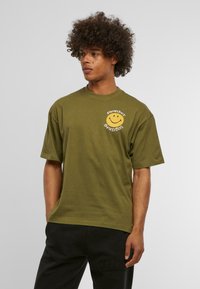 Market SMILEY ARC - T-shirts print - kelp