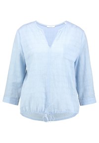 Hellblau, langärmlige Bluse mit V-Ausschnitt, strukturiertem Stoff, Fronttasche und verstellbarem Kordelzugsaum. Einfaches, lässiges Design.