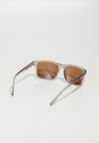 Armani Exchange Gafas de sol - shiny transparent brown/brown mirror