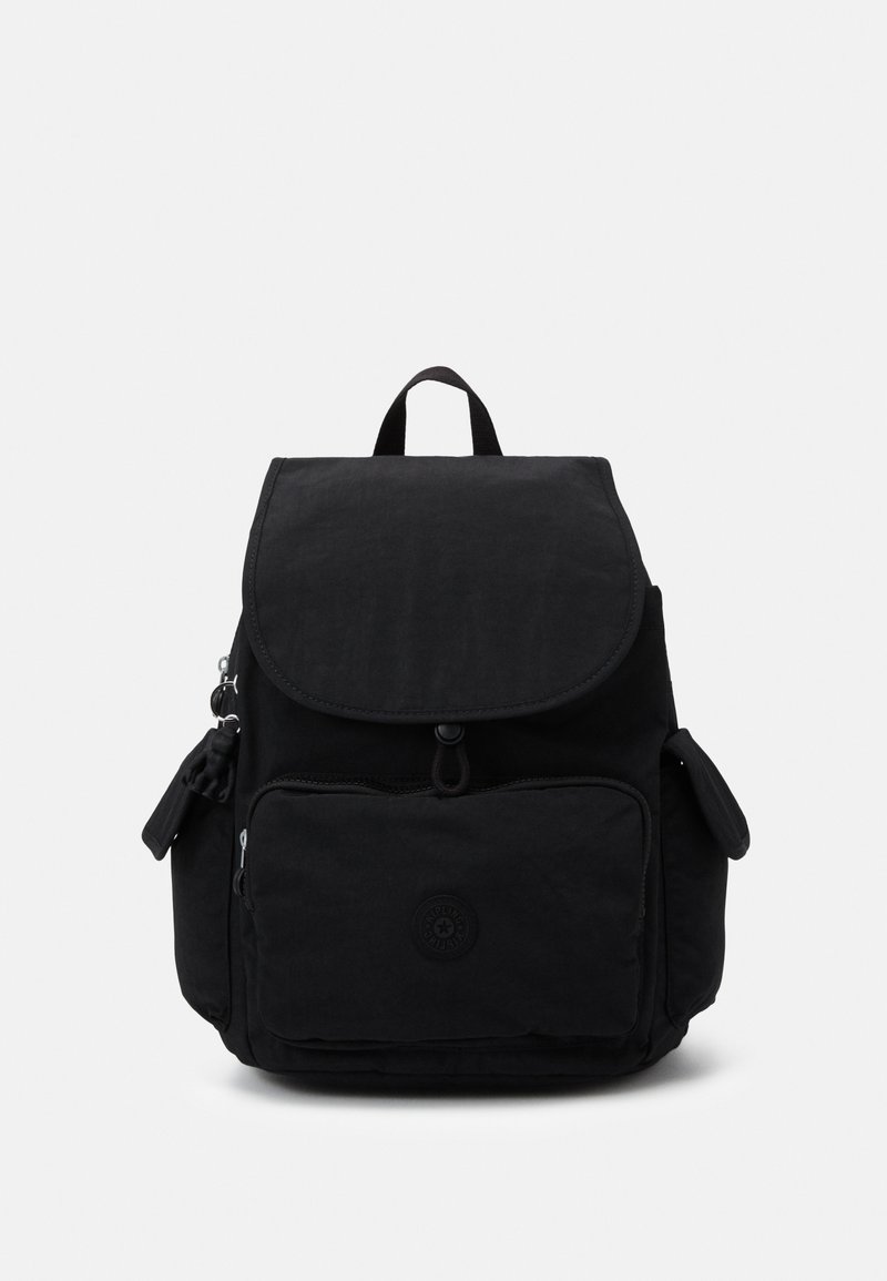 Black fabric backpack with a flap closure, front zip pocket, side pockets, and logo detail. Textured material with adjustable shoulder straps.