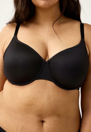 Sort bh med underwire, glat stof, justerbare stropper og bølget blondetrim langs udskæringen; formede skåle for støtte.