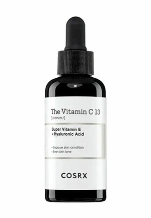Flacon compte-gouttes en verre foncé étiqueté "The Vitamin C 13 serum" avec Super Vitamine E et Acide Hyaluronique par COSRX pour l'amélioration de la peau.