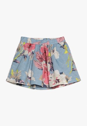 Jupe plissée bleue avec un motif floral coloré en rose, blanc, jaune et vert, posée à plat sur un fond blanc.