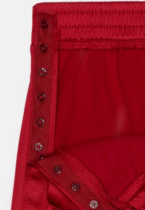 UNISEX - Tracksuit bottoms - dark red