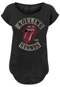 Zwarte T-shirt met een relaxte halslijn, voorzien van een rood en zwart tonglogo omringd door de tekst "THE ROLLING STONES" in een vintage stijl.