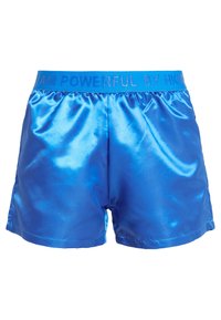 Blue satin shorts with a shiny texture and an elastic waistband featuring the text "I AM POWERFUL BY HK." Tailored fit, short length.