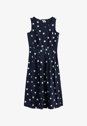Vestido midi sin mangas azul marino con lunares blancos, cintura ajustada, escote redondo y falda plisada.