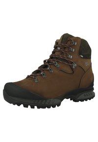 Botte de randonnée marron en cuir et matériaux synthétiques. Présente des œillets en métal, une semelle en caoutchouc durable et un design à cheville haute pour un soutien optimal.