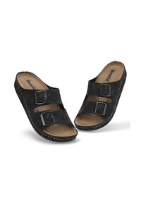 Sandalias deslizantes de ante negro con dos correas ajustables con hebillas de metal, planta acolchada marrón y detalles cosidos a lo largo de la suela.