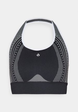 Soutien-gorge de sport noir avec un design à encolure halter. Présente des motifs texturés en blanc, y compris des rayures et des pois. Tissu doux et élastique avec un col rond.