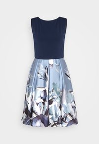 Dress with a navy top and a flared skirt in light blue, featuring floral patterns in purple, green, and black, made from smooth fabric.
