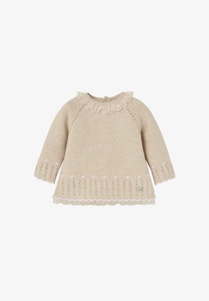 Pull en tricot beige avec un col à volants, des manches longues et un ourlet décoratif avec des motifs perforés et de petites accents roses.