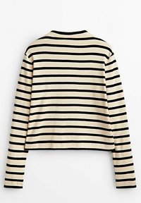 Striped long-sleeve top in cream and black. Features horizontal stripes, a round neckline, and a slightly cropped cut. Soft fabric texture.
