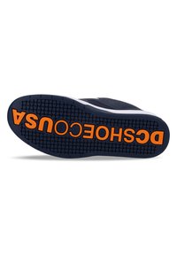 Navy blue sneaker sole with textured rubber, featuring orange branding "DSCHOCUSA" prominently displayed in bold letters.