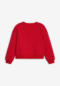 Felpa rossa con un fit rilassato, polsini e orlo a costine, e una texture liscia e morbida. Presenta un colletto rotondo e una linea delle spalle scesa.