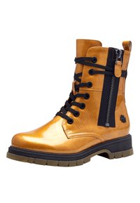 Bottine lacée en matériau synthétique orange brillant, avec une fermeture éclair sur le côté, des lacets noirs et une surface texturée sur une semelle en caoutchouc solide.