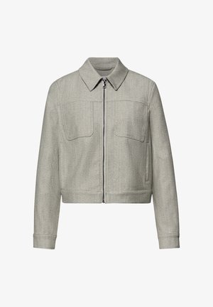 Hellgraue Fischgräten-Zip-up-Jacke mit spitzem Kragen, langen Ärmeln und zwei Brusttaschen, dargestellt vor weißem Hintergrund.