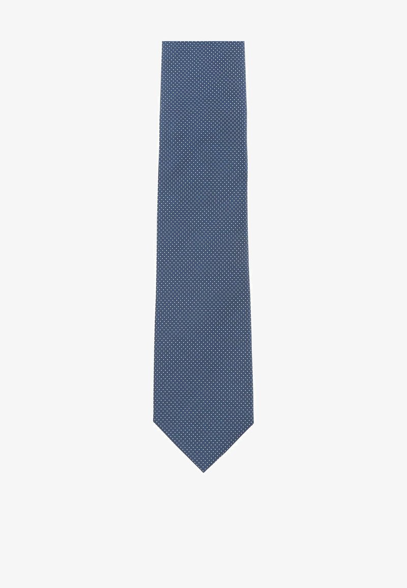 Navy tie with small white polka dots, made of smooth fabric, featuring a pointed tip and a narrow design.