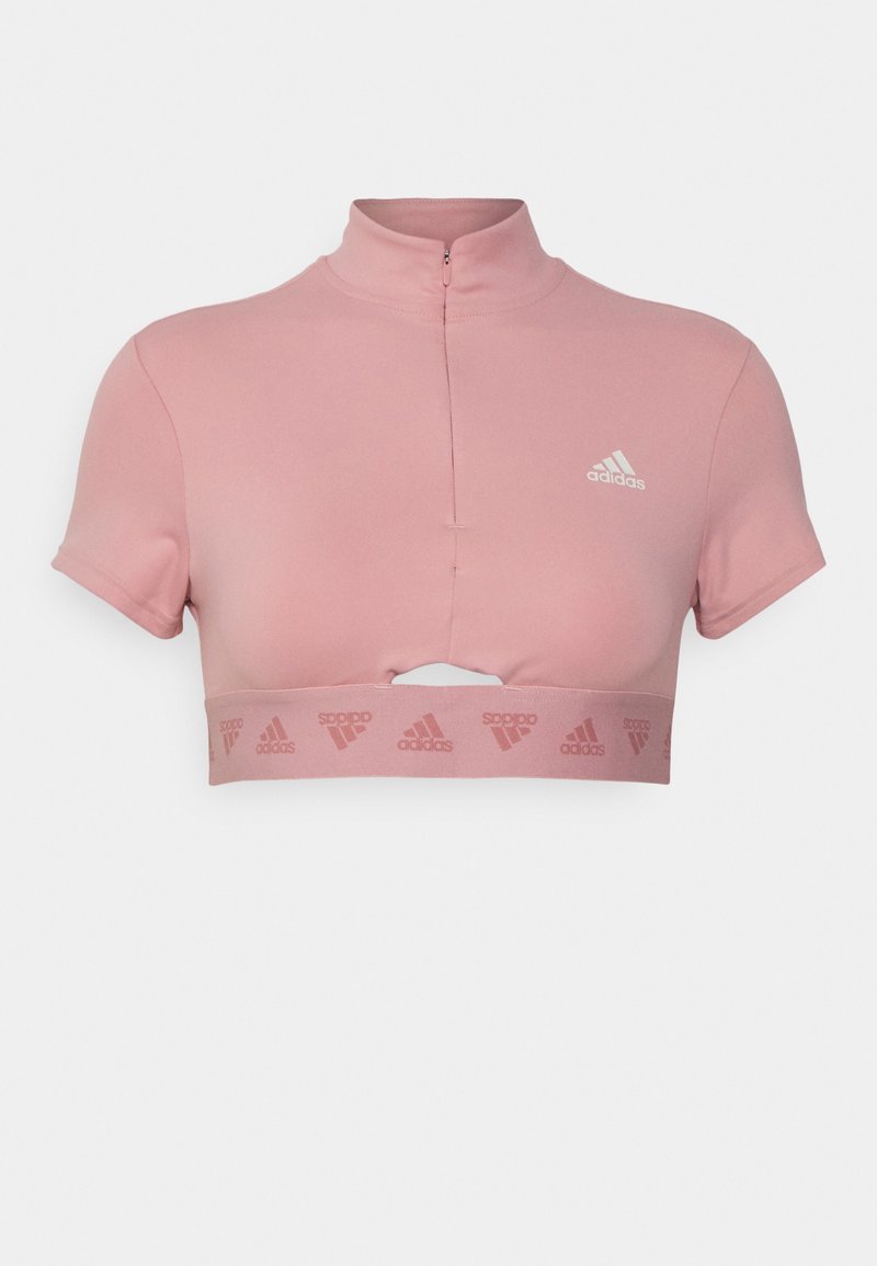 Rosa kortärmad sporttop med hög krage, korta ärmar och en bred nederkant med ett upprepat logomönster. Mjuk och stretchig material.