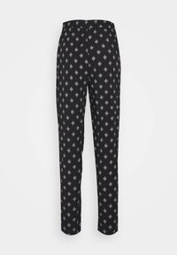 Černé kalhoty s geometrickým vzorem v bílé a šedé, s rovný střih a elastickým pasem pro pohodlí.