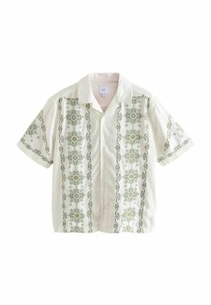 Lühikeste varrukatega helekollane särk, millel on ees ja varrukatel sümmeetrilise mustriga rohelised lilletikandid ning nööbiga kinnis.