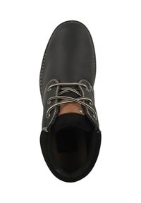 Black leather ankle boot with beige laces, circular hardware, and a brown leather accent on the tongue. Soft, textured interior finish.