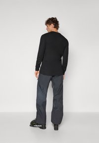 Norrøna LOFOTEN GORE-TEX INSULATED PANTS - Lyžiarske nohavice - caviar black