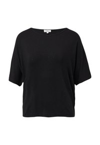 Czarny krótki t-shirt z luźnym krojem, miękkiego materiału i subtelnym wzorem w kropki. Okrągły dekolt bez widocznych elementów metalowych.