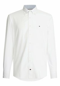 Wit overhemd met lange mouwen van katoen, voorzien van een button-down kraag, knopen aan de voorkant en een klein logo op de borst. Ruitpatroon aan de binnenkant van de kraag.