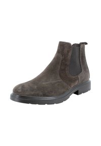 Stivaletto Chelsea in suede marrone con pannelli elastici neri ai lati e suola in gomma nera spessa, inclinato per mostrare il lato esterno e la parte anteriore.