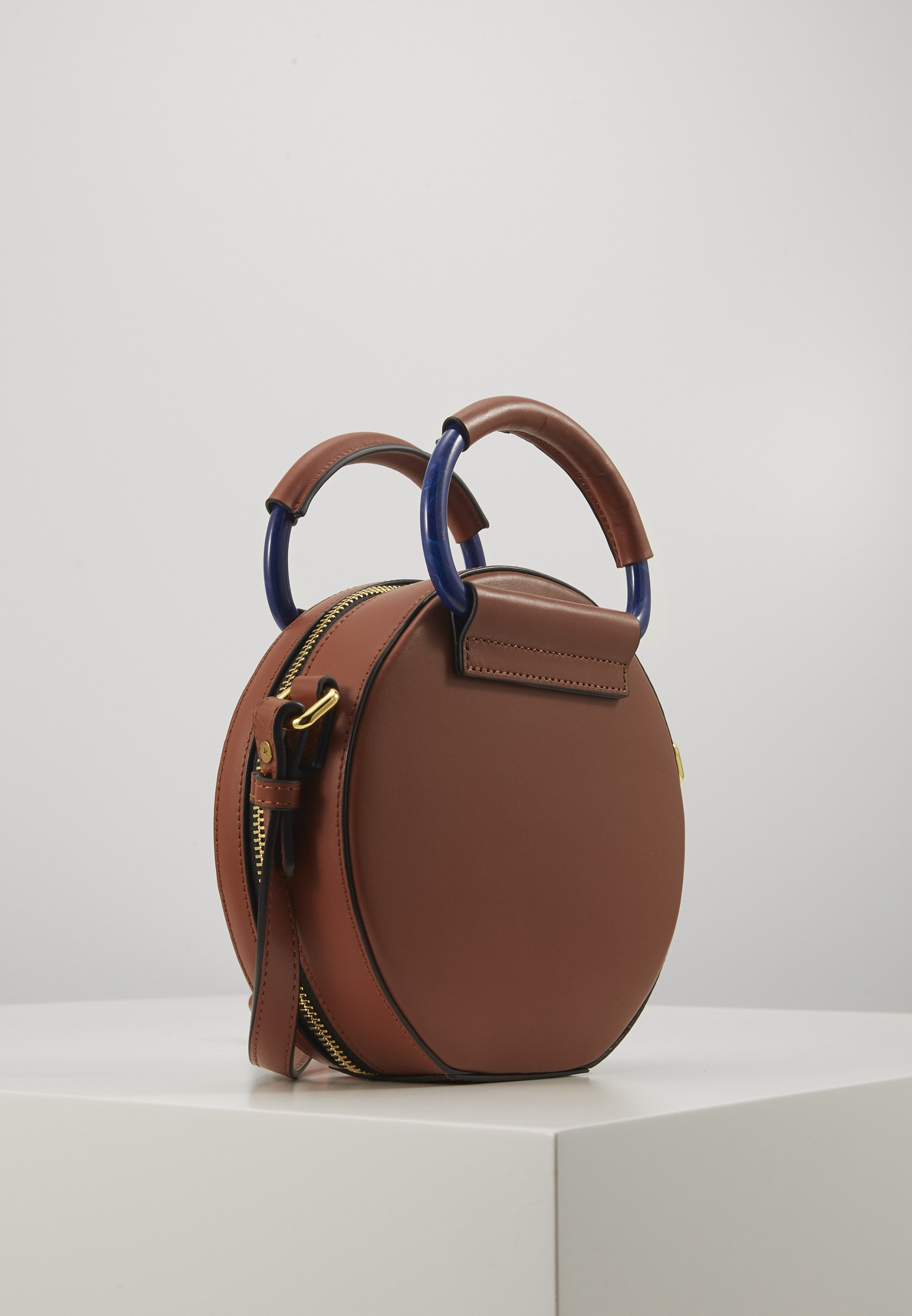 tan round bag