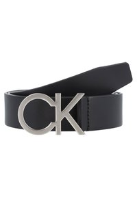 Black leather belt featuring a silver metal buckle with a circular design and the letters "CK" integrated into the buckle.