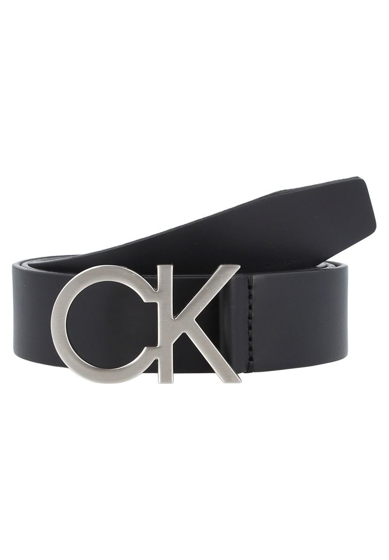 Black leather belt featuring a silver metal buckle with a circular design and the letters "CK" integrated into the buckle.