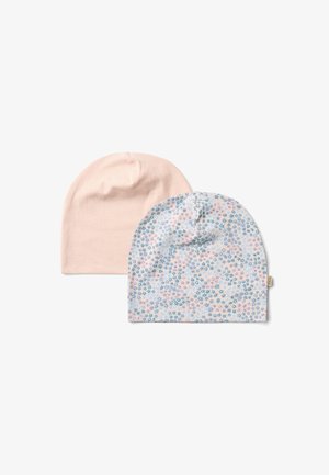 To myke stoff-beanies, en ensfarget blek rosa, den andre blek rosa med et blått og lavendelfarget blomstermønster.