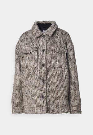 Brown and white herringbone wool jacket with black buttons, long sleeves, two chest flap pockets, and a collar.