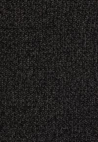 Strickstofftextur in tiefem Schwarz, mit einem groben Muster und sichtbaren Fasern, das ein warmes und gemütliches Aussehen erzeugt.
