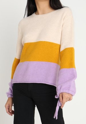 Stickad tröja - beige
