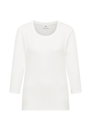 Witte katoenen longsleeve t-shirt met ronde hals, gladde textuur en een ontspannen pasvorm. Merkenlabel "CECI" is zichtbaar bij de hals.