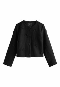 Black cropped jacket with textured fabric, featuring round neck, long sleeves, front button closure, and beaded bow accents.