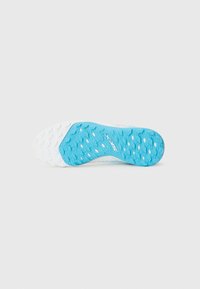 Shoe outsole featuring a textured blue and white rubber with a patterned grip and logo detail, designed for traction and durability.