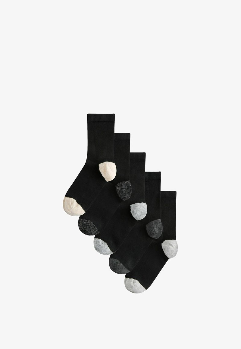 Viis paari musti põlvikuid, mille varvaste ja kanna värvid on erinevad: kreemikas, mustakirju, helehall, tumehall ja valge, üksteise peale asetatud.